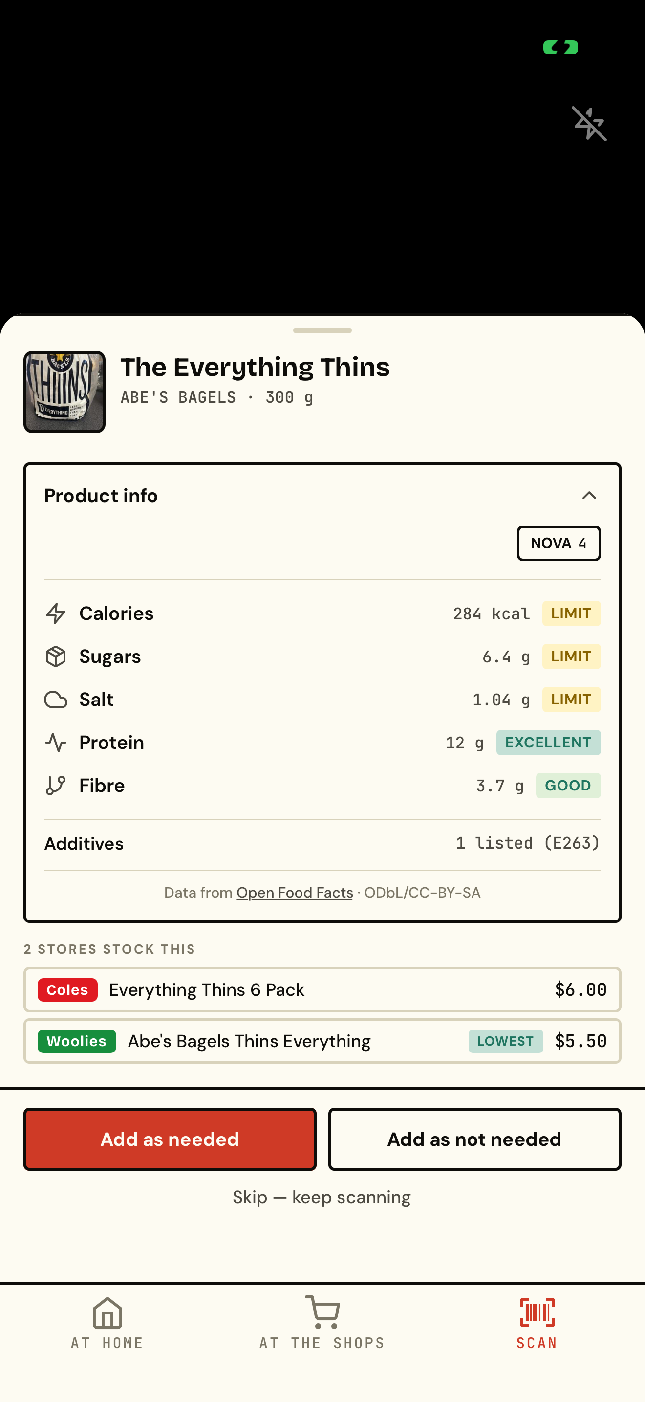 The Shops barcode scan result sheet showing a scanned product with brand, size, nutrition info and which stores stock it cheapest.